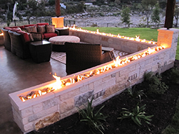 A Gothic Tudor style stone fireplace surround